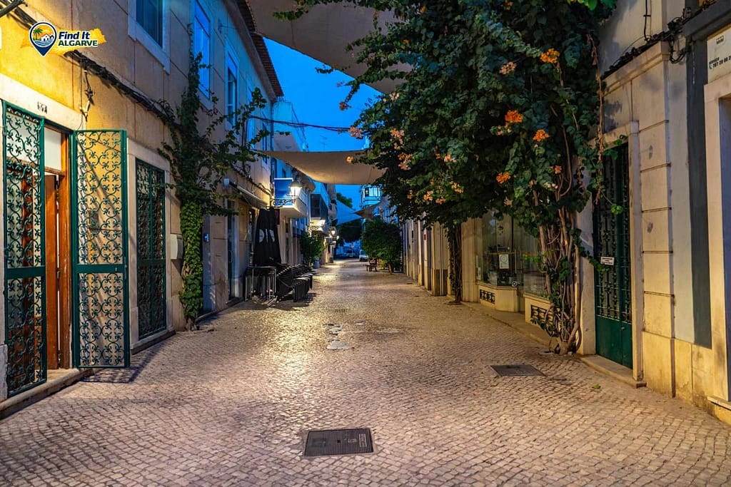 Typical street café scene in an Algarve town Portugal