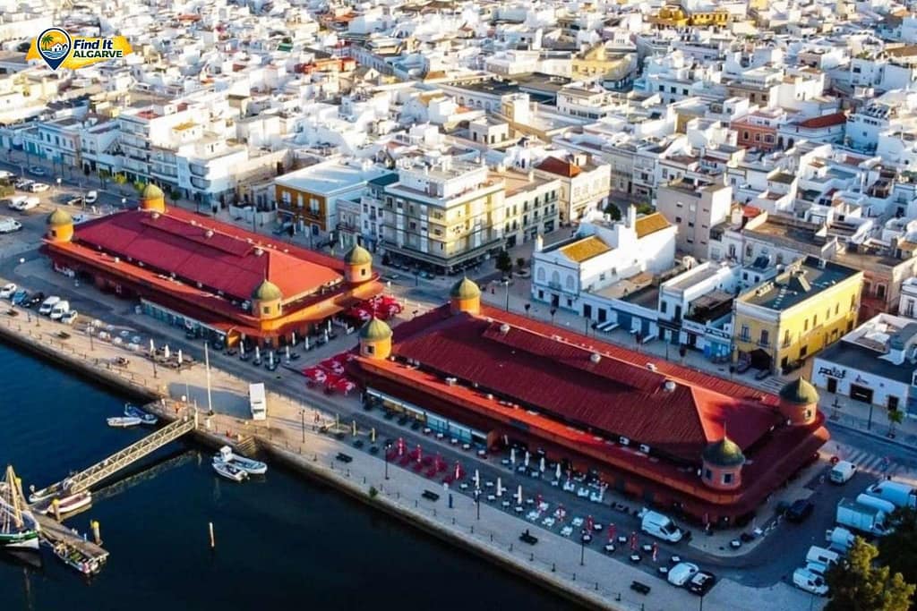 Olhão harbour with fishing boats and waterfront market in the eastern Algarve Portugal