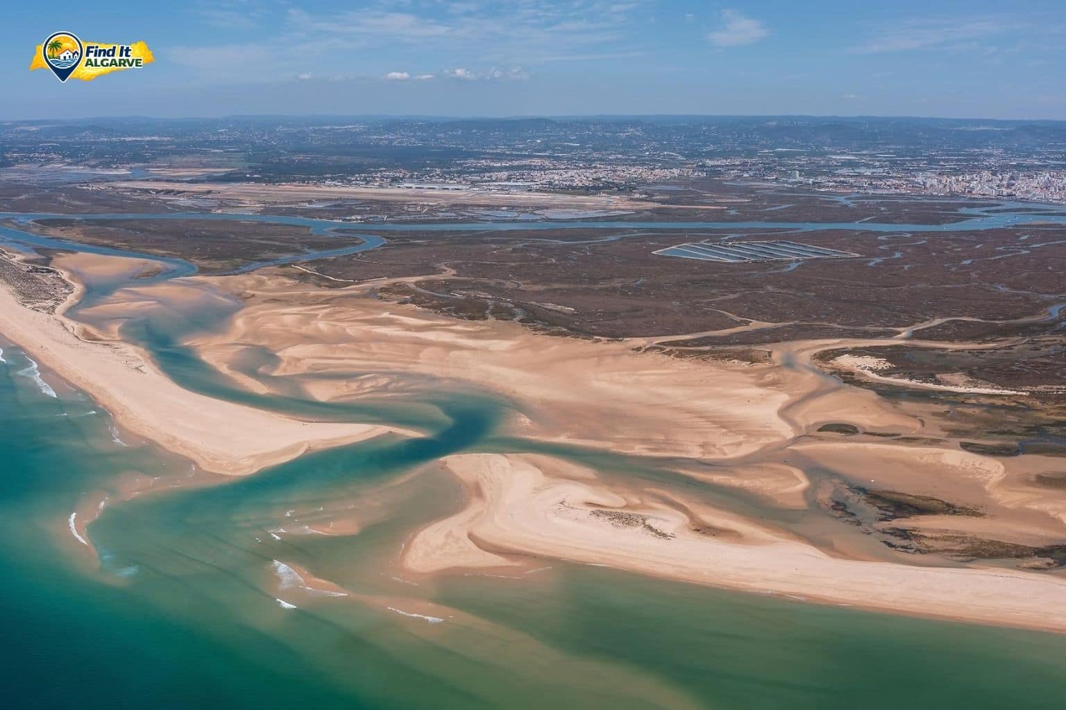 Aerial view of the Ria Formosa lagoon and barrier island beaches in the eastern Algarve Portugal